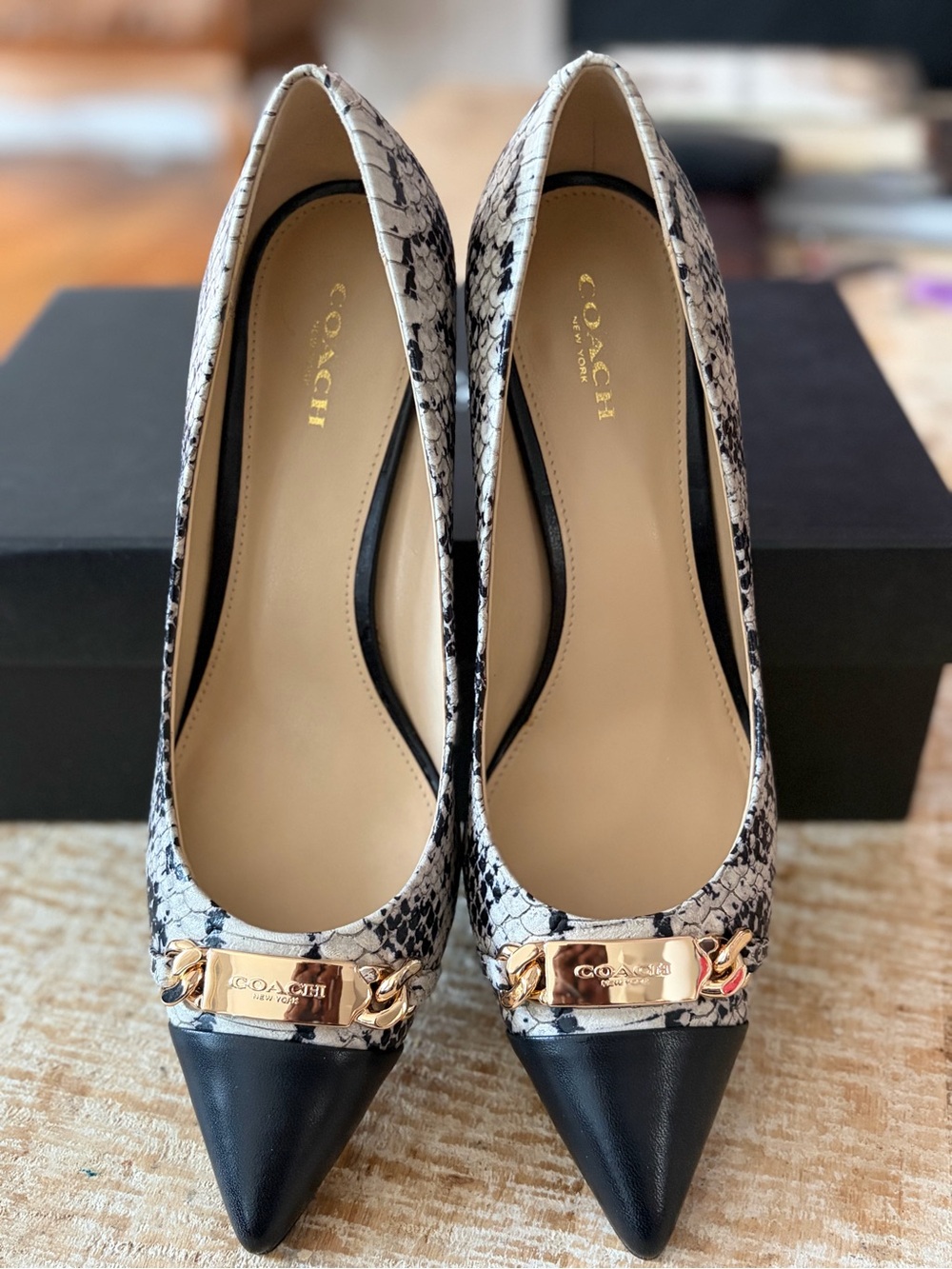 Coach Snake-Print Pumps with Black Pointed Toe and Gold Accent